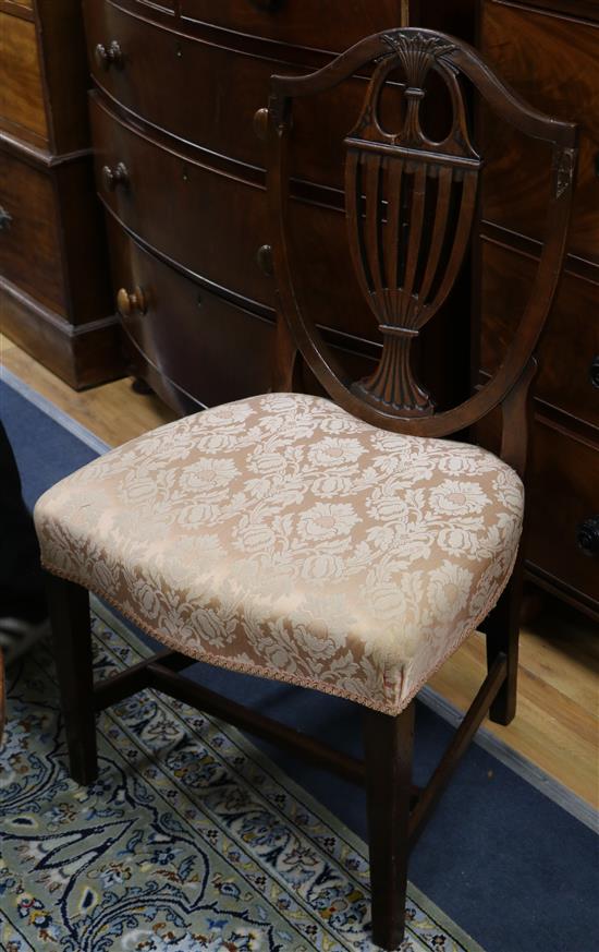 A set of six George III Hepplewhite design shield back mahogany dining chairs